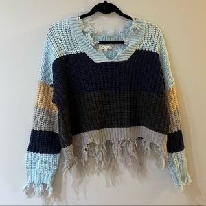 Distressed color block striped sweater